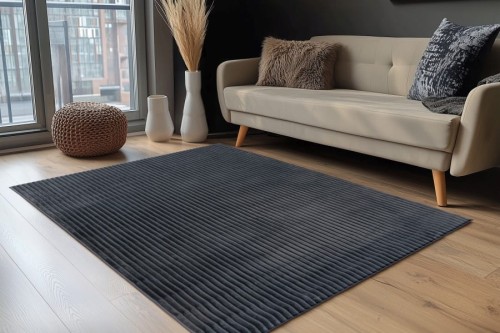 Grafitowy dywan 3d Lalee Hides Plush PLU 500 w salonie