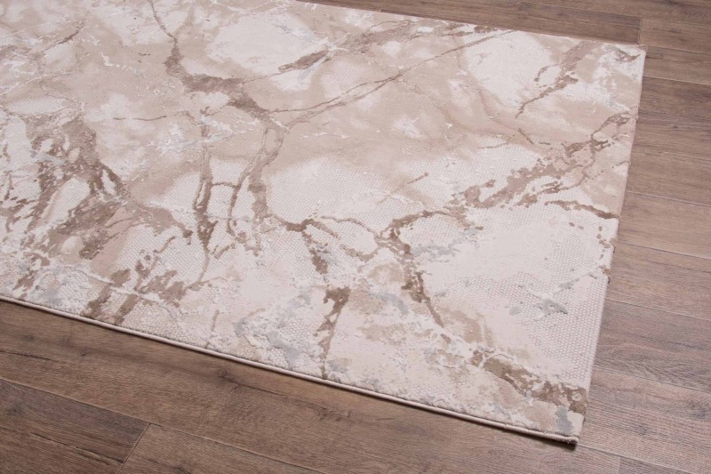 Rzut z boku na beżowy dywan nowoczesny Dywilan Lila 1 D841B