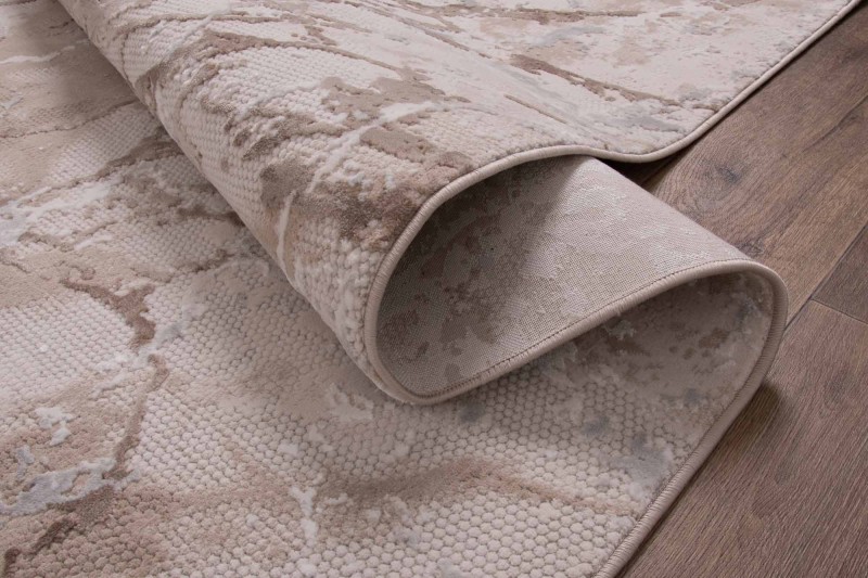 Spód beżowego dywanu nowoczesnego Dywilan Lila 1 D841B