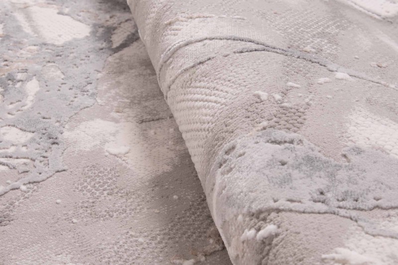 Zbliżenie runabeżowo-szarego dywanu nowoczesnego Dywilan Lila 1 D841B