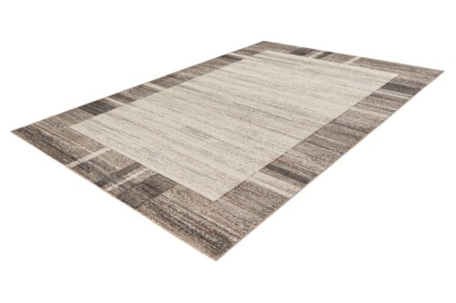 Rzut z boku na szaro-beżowy dywan nowoczesny Lalee Home Trendy Carving TRC 401