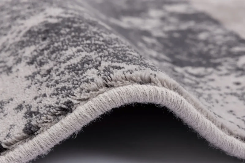 Dywan wełniany nowoczesny Agnella Isfahan  Fris jasnoszary - obszycie wełniane dywanu