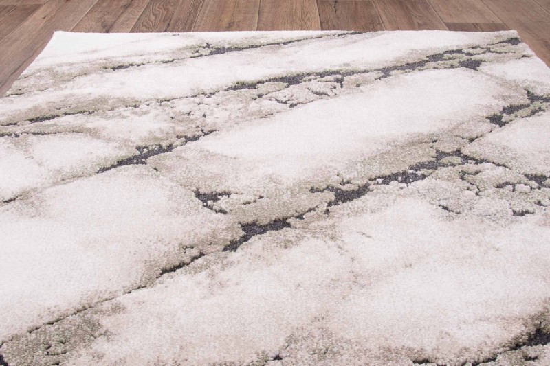 Rzut z góry na dywan nowoczesny Dywilan Nero 1/A2787A zielono-kremowy