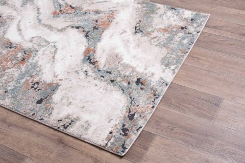 Na podłodze dywan nowoczesny Dywilan Nero 5/A2967A pomarańczowo-kremowy