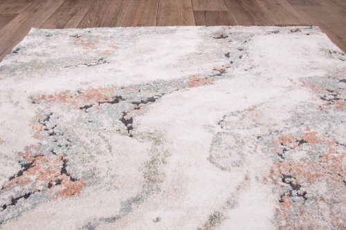 Rzut z góry na dywan nowoczesny Dywilan Nero 5/A2967A pomarańczowo-kremowy