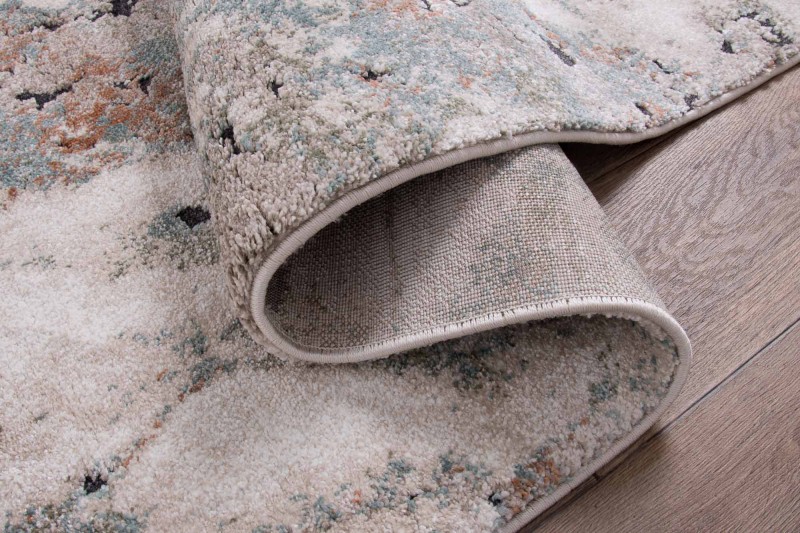 Spód dywanu nowoczesnego Dywilan Nero 5/A2967A pomarańczowo-kremowy