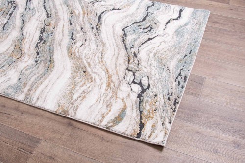 Rzut z boku na dywan nowoczesny Dywilan Nero 4/A2966A morsko-kremowy