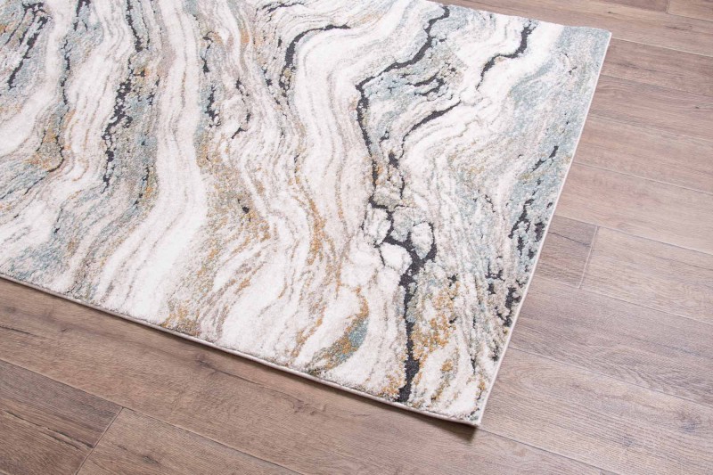 Rzut z boku na dywan nowoczesny Dywilan Nero 4/A2966A morsko-kremowy