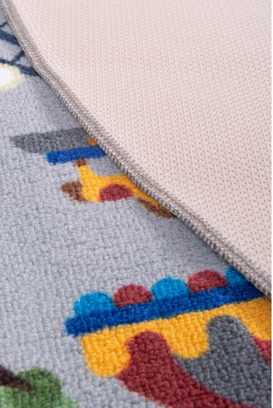 Runo i spód szarego okrągłego dywanu dziecięcego antypoślizgowego Ares ulice