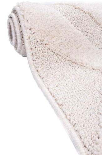 Bok kremowego dywanu shaggy Pisa romby