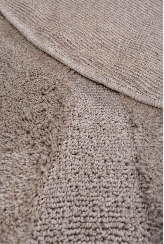 Spód beżowego dywanu okrągłego shaggy 3d Pisa fala