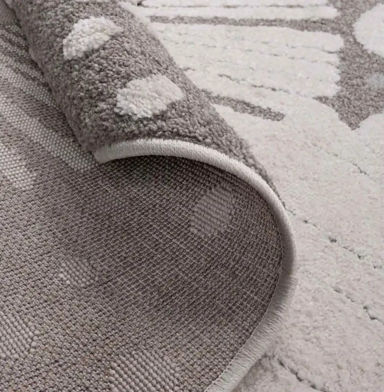 Zbliżenie dywanu dziecięcego okrągłego Elio lew szary-ivory