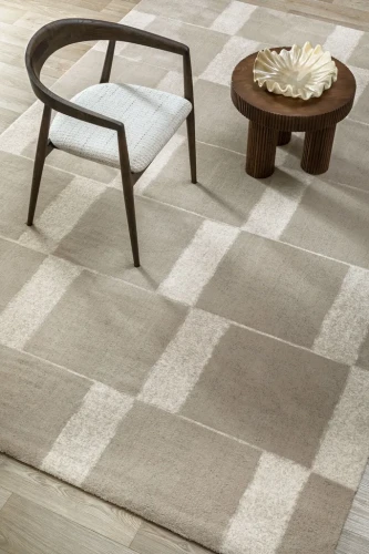 Krzesło i stoliczek na dywanie wełnianym Agnella Agnus Pavement szary (binding)