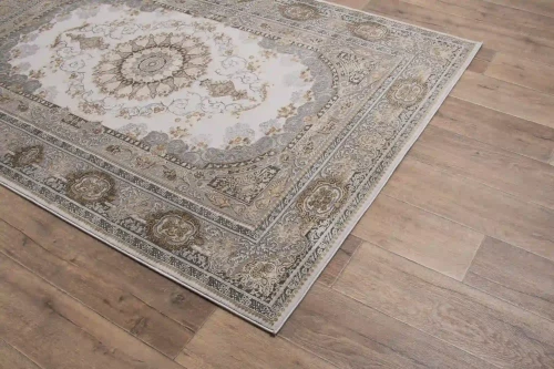 Na ciemnej podłodze dywan klasyczny Deluxe 9093 beige