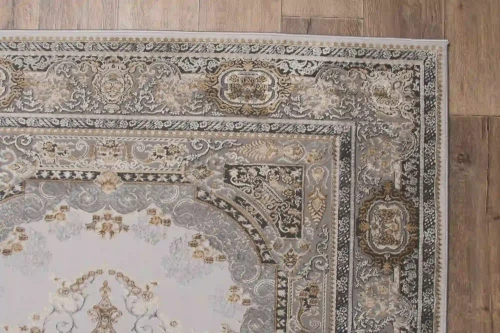 Zbliżenie wzoru dywanu klasycznego Deluxe 9093 beige