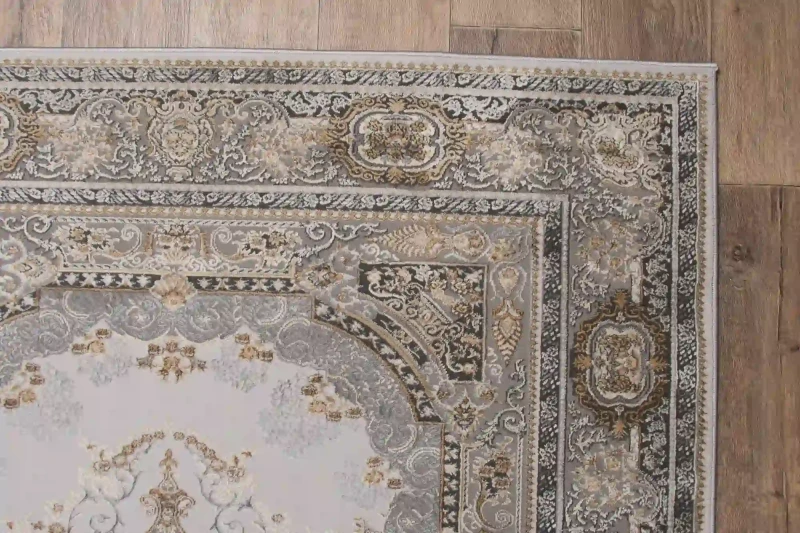 Zbliżenie wzoru dywanu klasycznego Deluxe 9093 beige