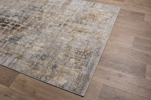 Na ciemnej podłodze dywan nowoczesny Deluxe 9095 beige