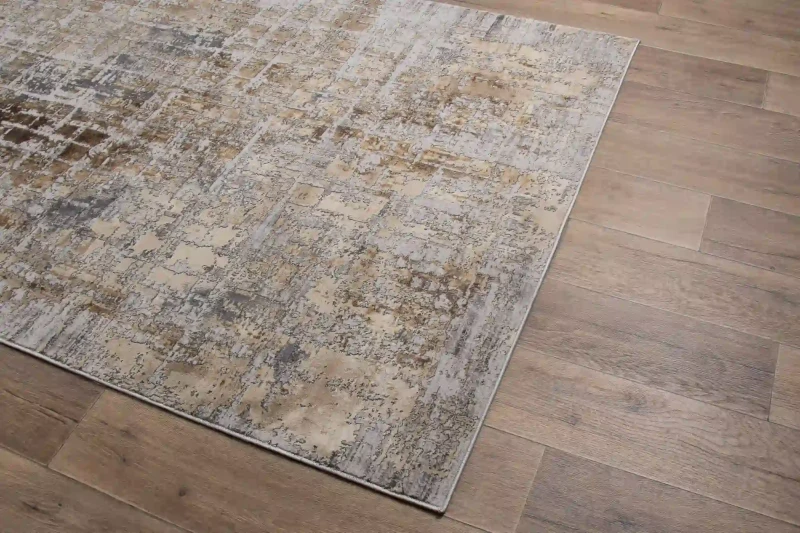 Na ciemnej podłodze dywan nowoczesny Deluxe 9095 beige