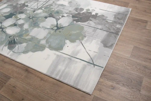 Na ciemnej podłodze dywan nowoczesny Myra 1532 green