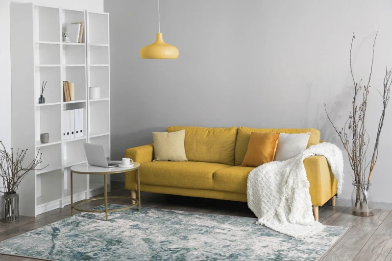 Aranżacja pokoju z dywanem nowoczesnym FD Sensi Surmer miętowy