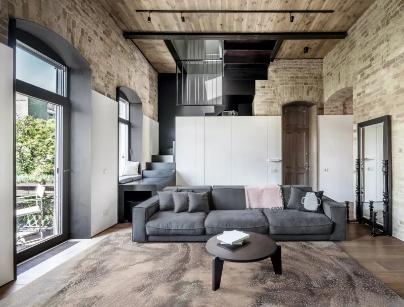 Dywan wełniany abstrakcja Agnella Isfahan Perlo wrzosowy w salonie