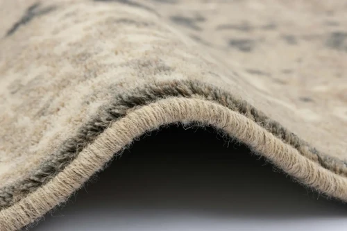 Bok dywanu wełnianego Agnella Isfahan Leno jasno szarego