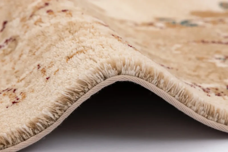 Bok dywanu wełnianego Agnella Agnus Bonaria krem