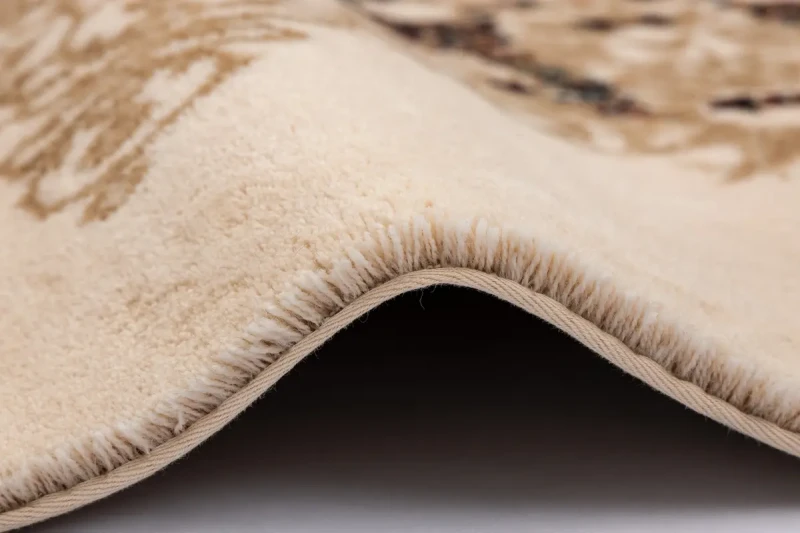 Runo dywanu wełnianego koło Agnella Agnus Julia krem