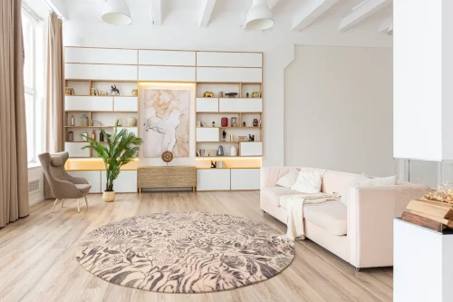 Dywan wełniany koło nowoczesny Agnella Agnus Fiorena alabaster w salonie