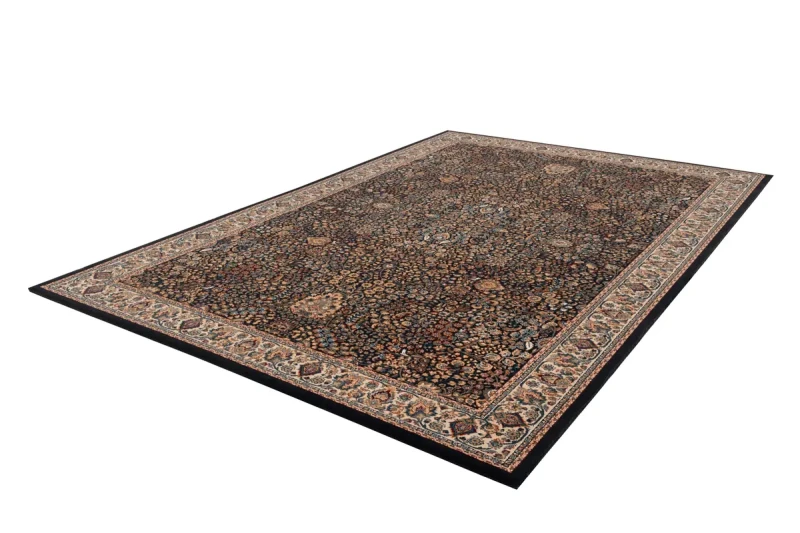 Rzut z boku na dywan wełniany tradycyjny Agnella Agnus Bruna granat