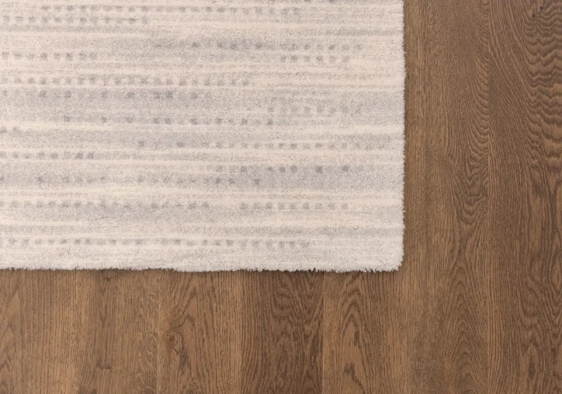 Dywan Agnella Calisia Baldo biały wzór na runie.webp