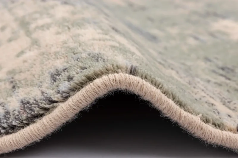 Zbliżenie runa dywanu okrągłego Agnella Isfahan Orso alabastrowy