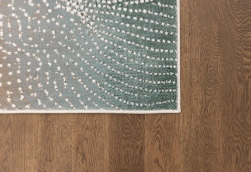 Dywan nowoczesny FD Lida Corin miętowy na ciemnej podłodze