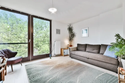 Aranżacja w salonie dywanu nowoczesnego FD Lida Corin miętowy