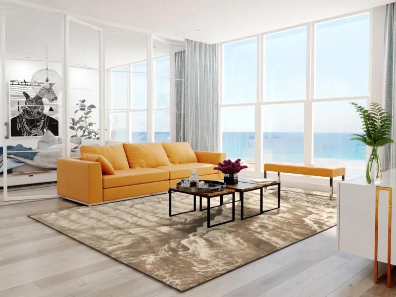 Nowoczesny dywan wełniany Agnus Marilu beż w nadmorskim salonie.webp