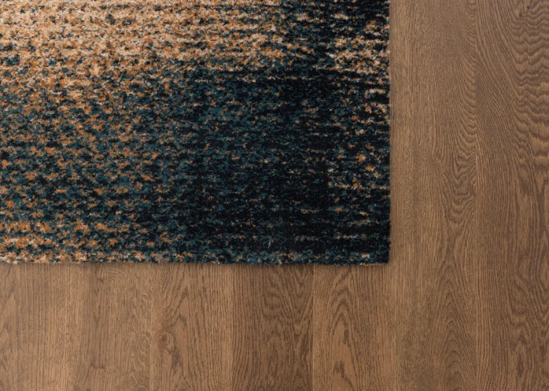 Gradientowy wzór na runie dywanu Agnus Savia szmaragd.webp