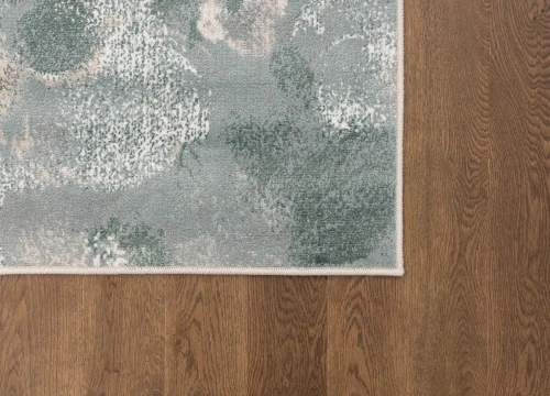 Dywan nowoczesny FD Sensi Floro miętowy na ciemnej podłodze