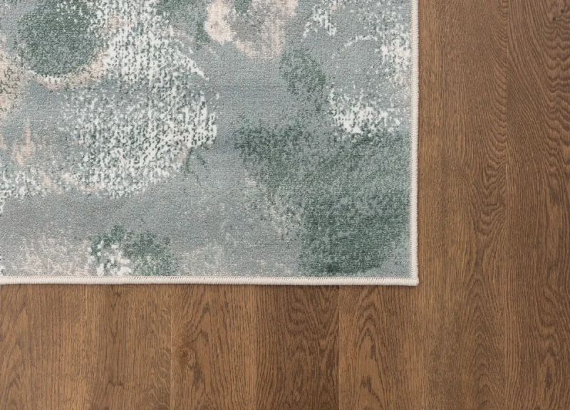 Dywan nowoczesny FD Sensi Floro miętowy na ciemnej podłodze