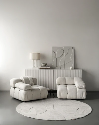 Dywan okrągły wełniany Agnella Ladnini Morphic Botanica jasny szary przy fotelach