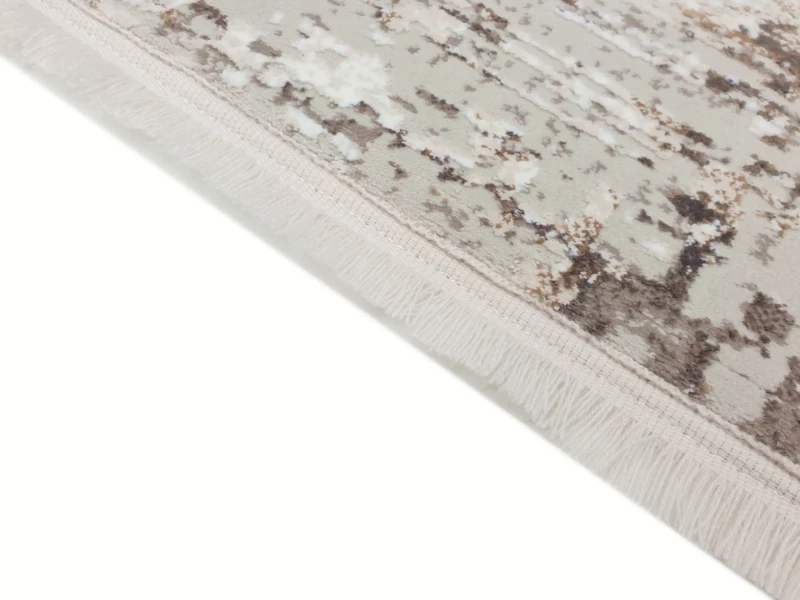 Wykończenie frędzlami dywanu nowoczesnego Exclusive 200 beżowo-złotego