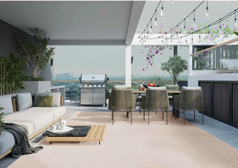 Kremowa wykładzina zewnętrzna płaskotkana Kenzy ivory w jodełkę na tarasie.webp