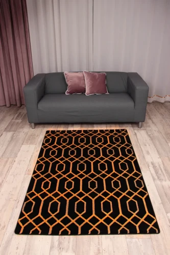Dywan geometryczny 3d Diamond Tyro K4427G czarno-złoty w salonie