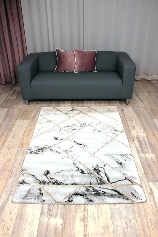 Dywan geometryczny marmur Diamond K4428G szaro-złoty w salonie
