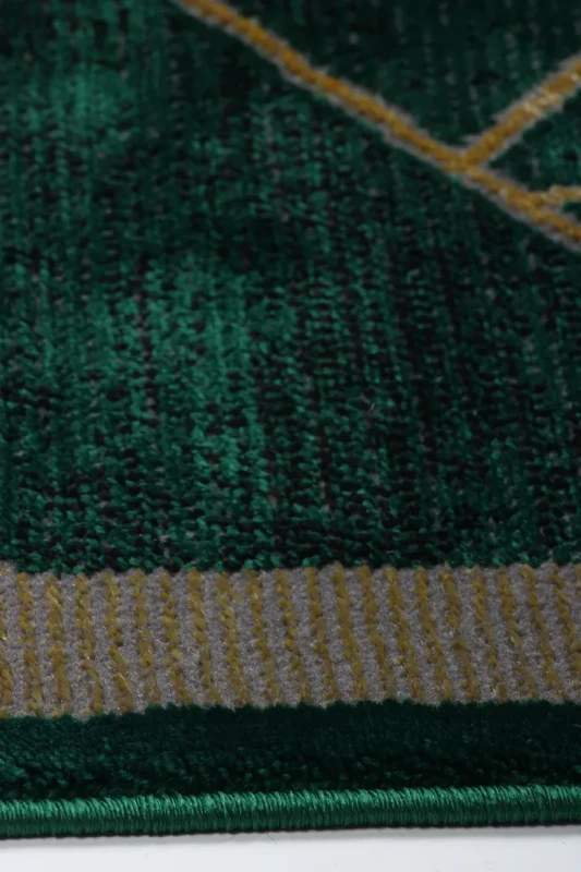 Dywan geometryczny Diamond K4479Y zielono-złoty zbliżenie brzegu