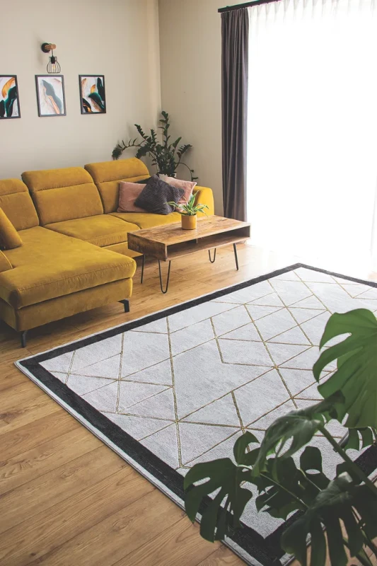 Dywan geometryczny Diamond K4488G szaro-złoty w salonie