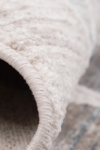 Dywan nowoczesny Camilla Santana Hamada 1875 turkus-beż brzeg z bliska