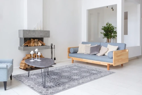 Dywan wełniany Agnella Isfahan Nour jasny niebieski w pokoju dziennym