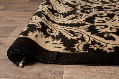 Dywan orientalny wełniany Gabbeh - zdjęcie zwiniętego dywanu