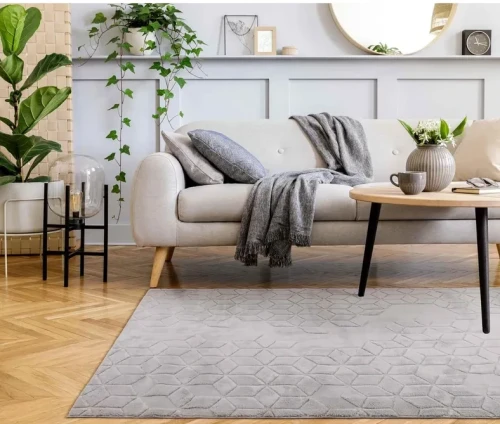 Dywan pluszowy Venesia geometria 3d szary w pokoju