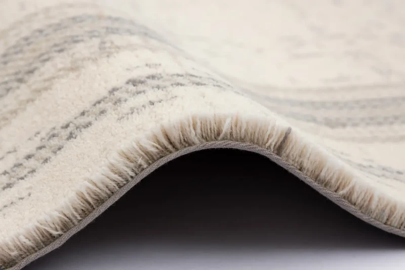 Dywan wełniany Agnella Agnus Loreta szary wysokość runa i wykończenie taśmą.webp